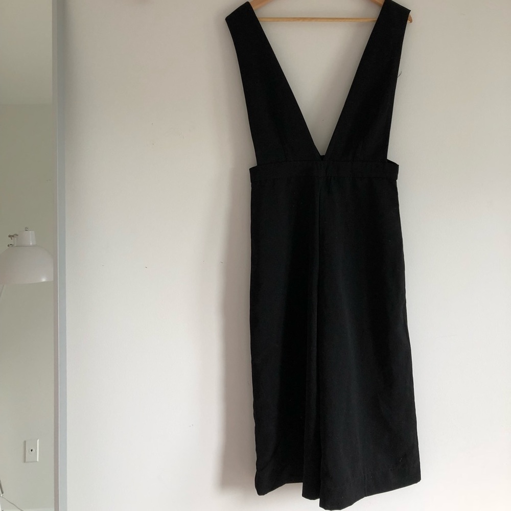 NWT Black deep v jumpsuit.